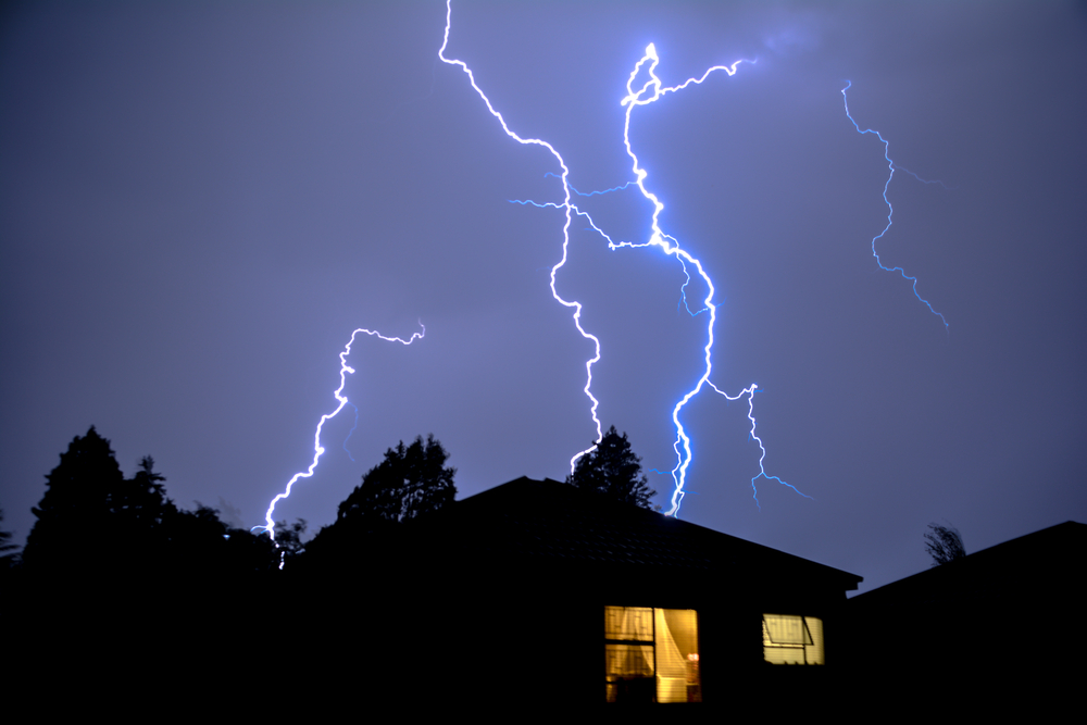Lightning striking urban home